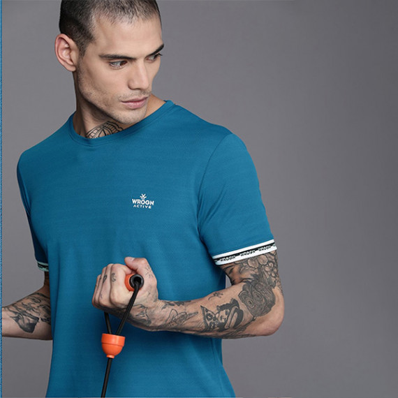 https://www.shop-ally.in/products/men-teal-blue-brand-logo-printed-casual-t-shirt